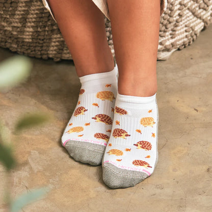 A woman wearing Ankle Compression Socks outside