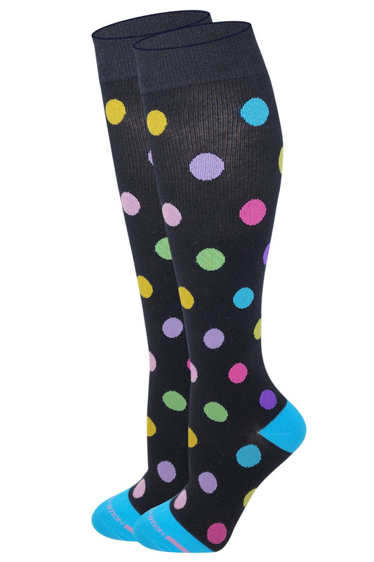 Dr. Motion women’s knee-high compression socks with large polka dot design and mild 8–15 mmHg support